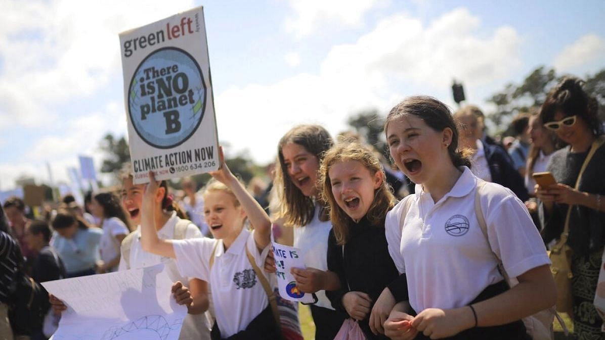  Protesters with placards participate in the Global Strike 4 Climate rally in Sydney, on Friday, 20 September 2019. Image used for representation.