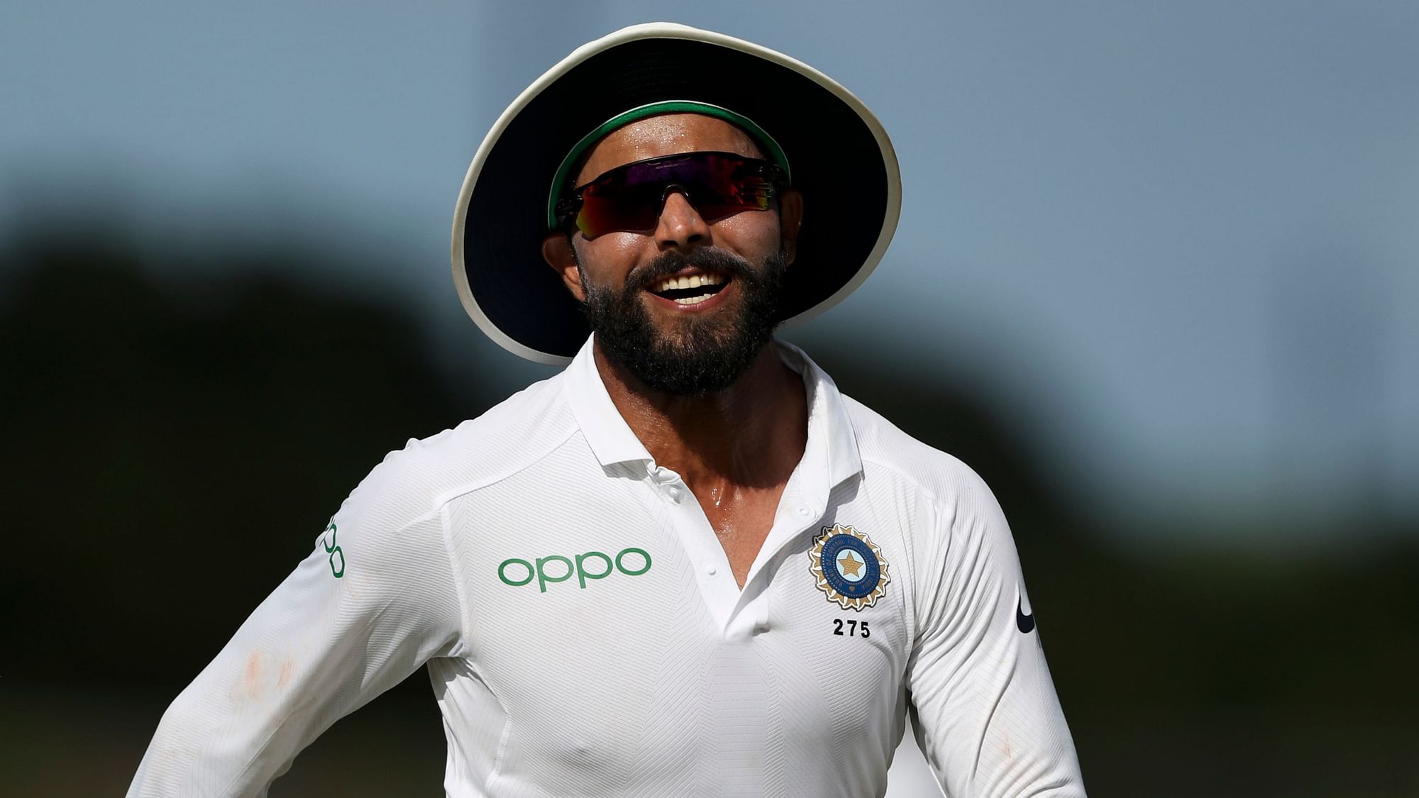 Ravindra Jadeja scored a defiant half-century and took two wickets in the first Test, helping India win by 318 runs in Antigua.