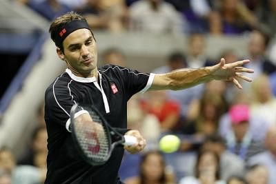 NEW YORK, Sept. 4, 2019 (Xinhua) -- Roger Federer hits a return during the men