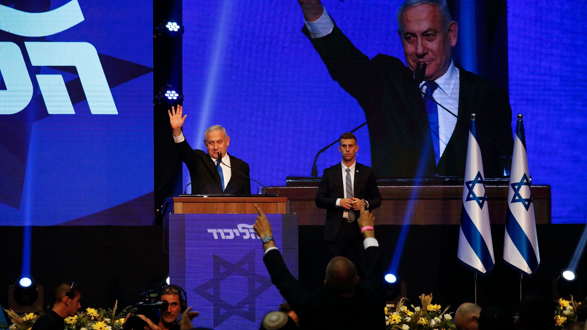 Israeli Prime Minister Benjamin Netanyahu addressees his supporters at party headquarters after elections in Tel Aviv on 18 September.
