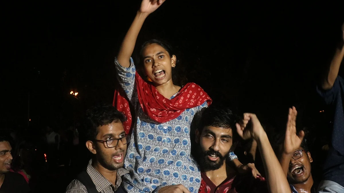Newly-elected JNU Students’ Union president Aishe Ghosh celebrates after the announcement of the results on 17 September. 