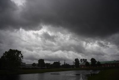 WILMINGTON, Sept. 14, 2018 (Xinhua) -- Storm clouds rise above the city of Wilmington as Hurricane Florence comes ashore in North Carolina, the United States, on Sept. 13, 2018. The U.S. Energy Information Administration (EIA) on Thursday said that Hurricane Florence is likely to affect energy infrastructure throughout the southeastern region of the United States.   (Xinhua/Liu Jie/IANS)