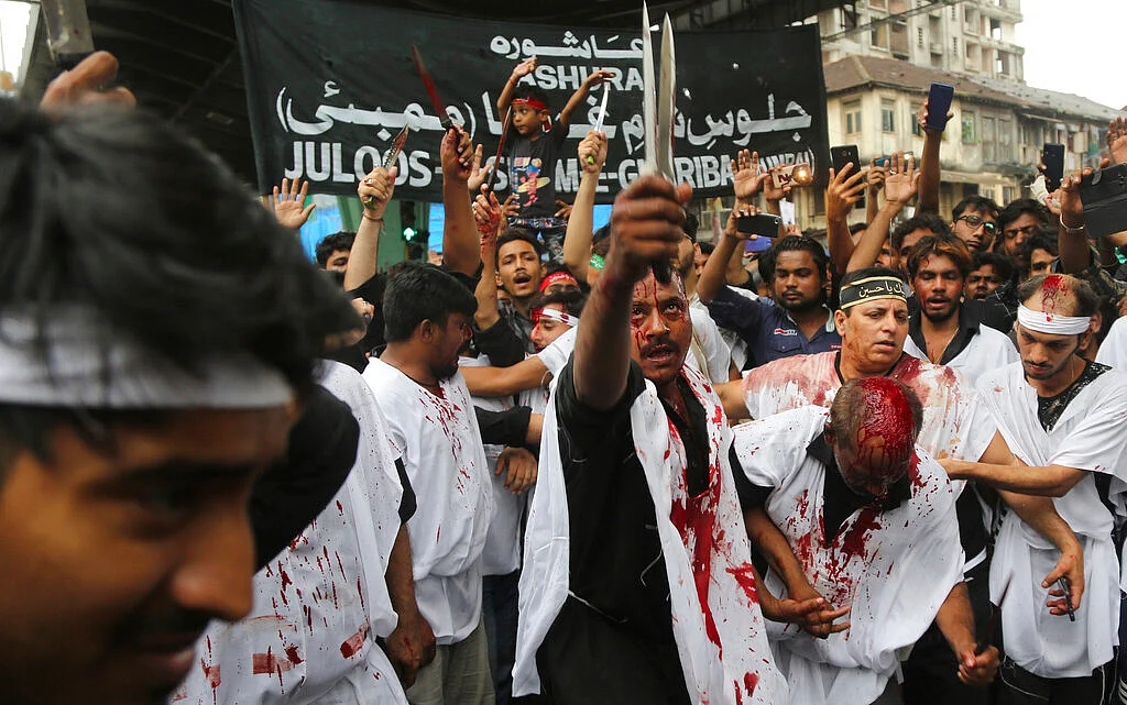 Indian Shiite Muslims flagellate themselves during a procession to mark Ashoura in Mumbai. Ashoura falls on the 10th day of Muharram, the first month of the Islamic calendar, when Shiites mark the death of Hussein, the grandson of the Prophet Muhammad, at the Battle of Karbala in present-day Iraq in the 7th century. 