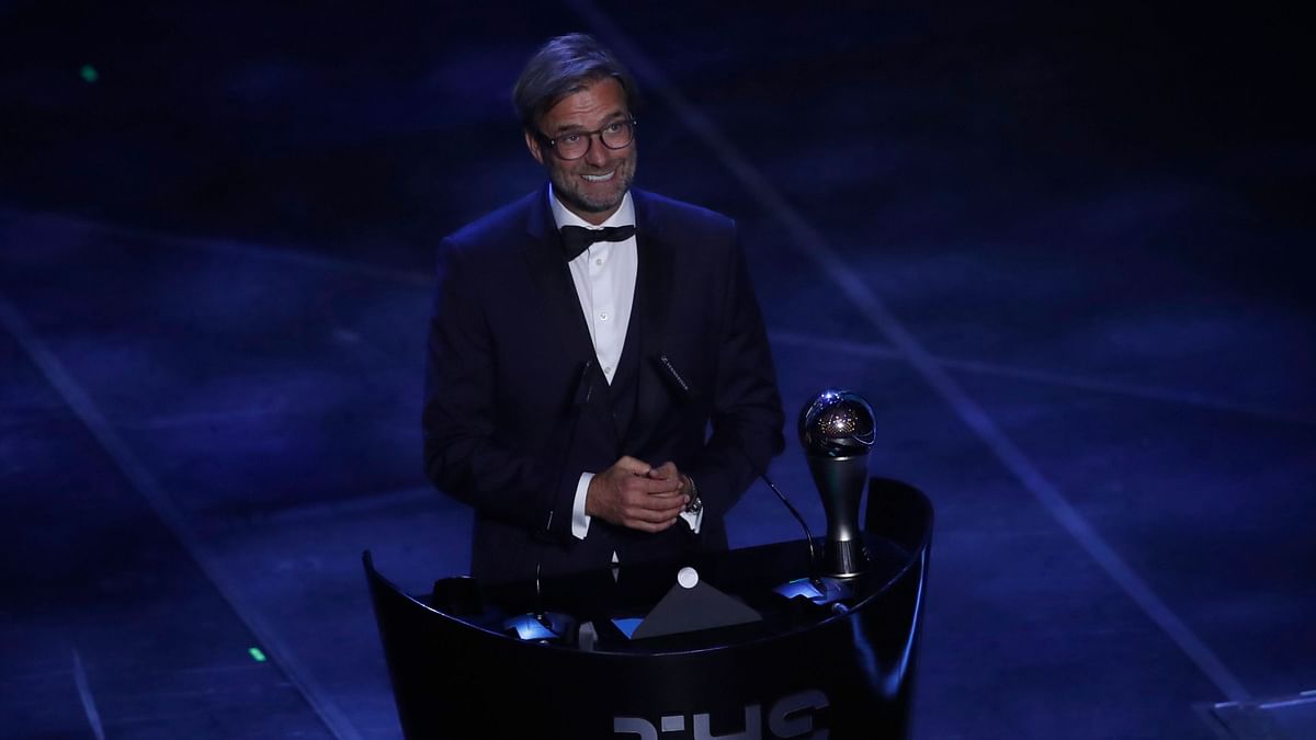 Liverpool manager Jurgen Klopp was named coach of the year at the at a lavish ceremony in Milan on Monday.