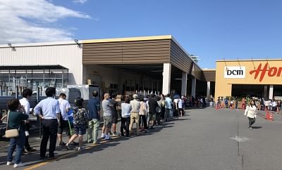 HOKKAIDO, Sept. 6, 2018 (Xinhua) -- People queue in front of a supermarket after an earthquake in Date, Hokkaido, Japan, on Sept. 6, 2018. A 6.9-magnitude earthquake hit Japan