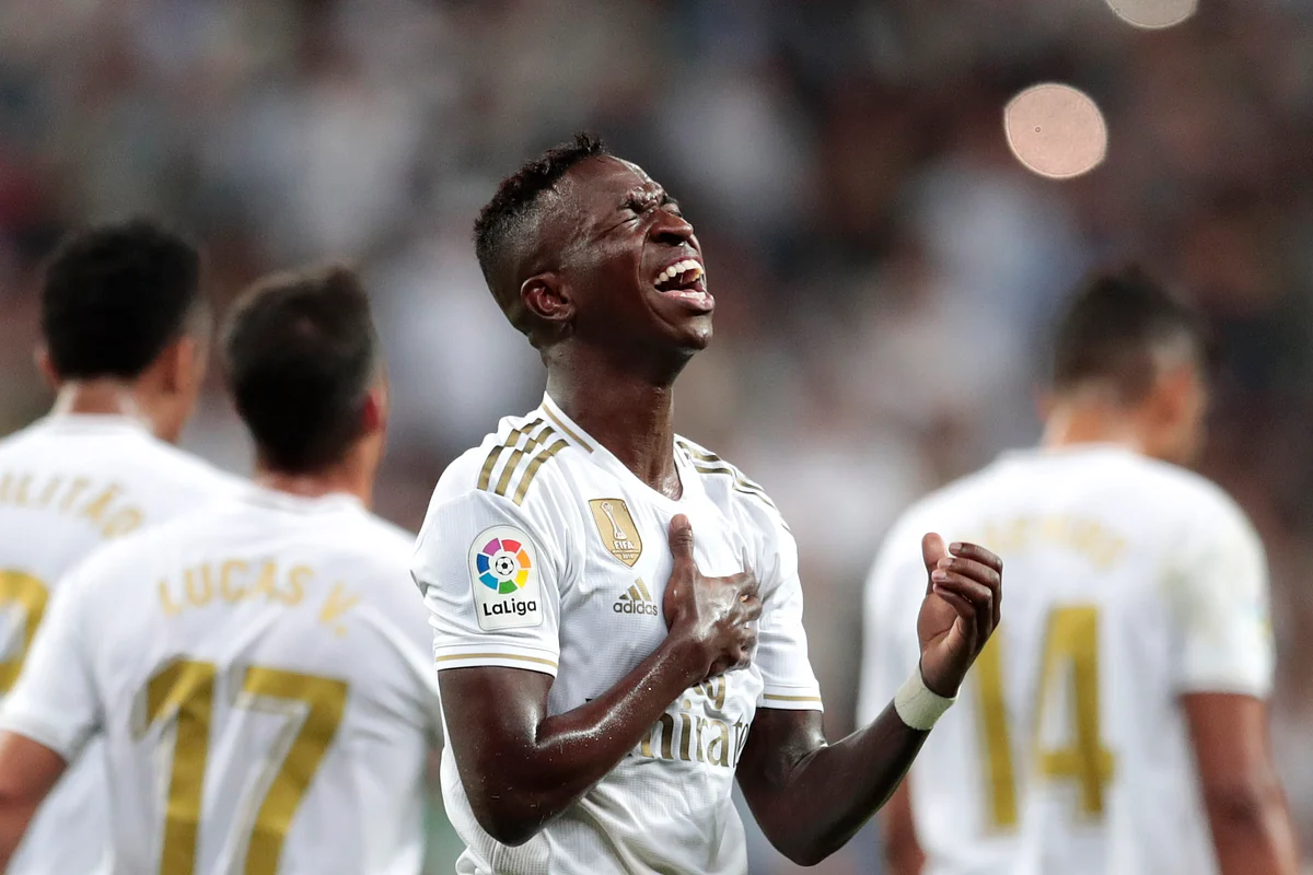 Real Madrid’s Vinicius Jr. celebrates scoring the opening goal during the Spanish La Liga soccer match between Real Madrid and Osasuna at the Santiago Bernabeu.