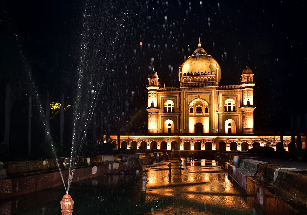 A view of the illuminated Safdarjung Tomb with its newly built fountain, in New Delhi.