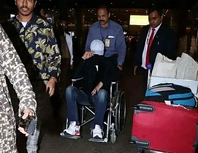 After shooting for his film "Angrezi Medium" in London, actor Irrfan Khan has returned to India. Irrfan was spotted at Mumbai airport on Friday. A lot of pictures are doing the rounds on the Internet in which he is seen hiding his face and using wheelchair to get to his car, reports republicworld.com.