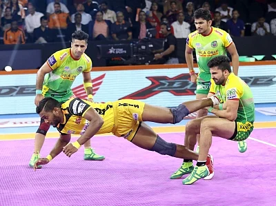 Pune: Players in action during Pro Kabaddi Season 7 match between Telugu Titans and Patna Pirates at Shree Shiv Chhatrapati Sports Complex in Pune on Sep 20, 2019. (Photo: IANS)
