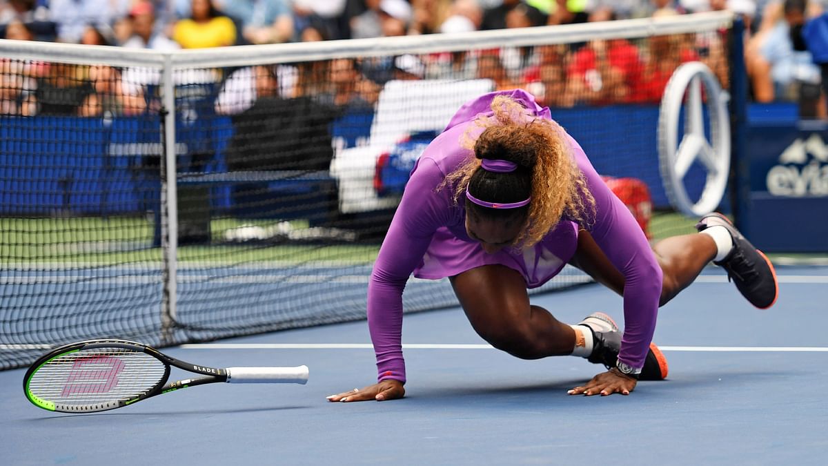 Serena required a medical timeout in the second set after rolling her right ankle as she approached the net.