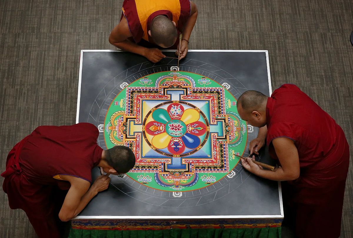 Tibetan Buddhist monks from the Drepung Loseling Monastery in southern India create a sand mandala in the atrium of the Colket Center at Roanoke College in Salem on Thursday, 26 September, 2019.