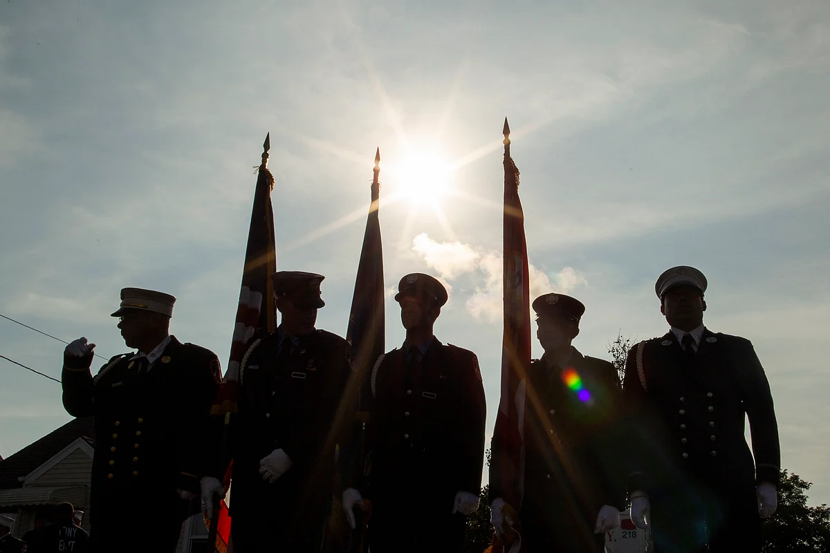 New York Fire Department members attend a second funeral service for FDNY firefighter Michael Haub in Franklin Square, New York on 10 September. 