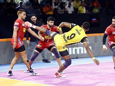 Pune: Players in action during a Pro Kabaddi Season 7 match between Telugu Titans and Dabang Delhi K.C. at Shree Shiv Chhatrapati Sports Complex in Pune on Sep 16, 2019. (Photo: IANS)