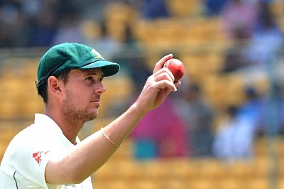 Bengaluru: Josh Hazlewood of Australia during the fourth day of the second test match between India and Australia at M. Chinnaswamy Stadium in Bengaluru on ​March 7, 2017. (Photo: IANS)​​
