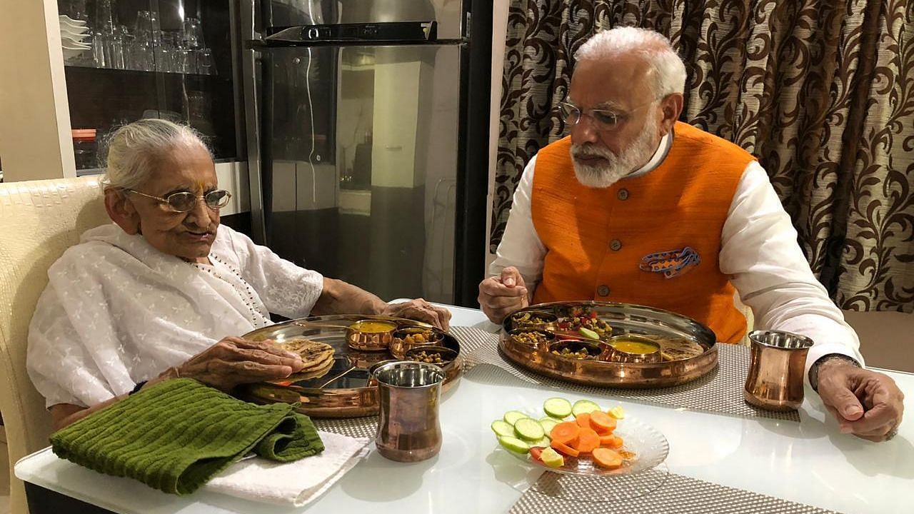 File photo of Heeraben Modi and PM Modi.