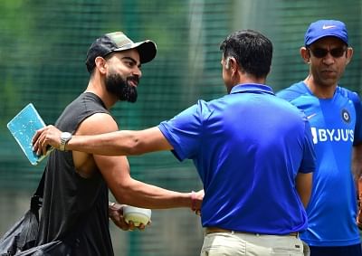 Bengaluru: Indian skipper Virat Kohli and National Cricket Academy (NCA) head Rahul Dravid during a practice session ahead of the 3rd T20 match against South Africa at Chinnaswamy Stadium, in Bengaluru on Sep 20, 2019. (Photo: IANS)