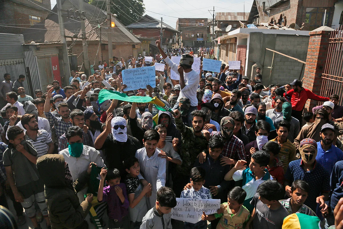 Kashmiris protest against the Government of India, in Srinagar, on 13 September.