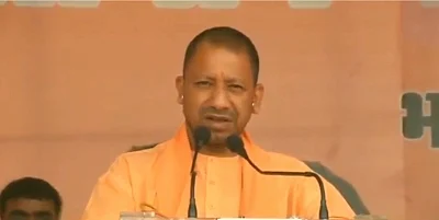 New Delhi: Uttar Pradesh Chief Minister Yogi Adityanath addresses a BJP rally in New Delhi on May 7, 2019. (Photo: IANS)