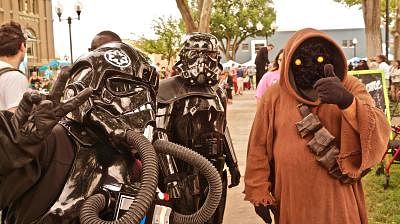 HOUSTON, July 7, 2019 (Xinhua) -- Visitors participate in the 2019 UFO Festival in Roswell, New Mexico, the United States, on July 6, 2019. The city of Roswell hosts the annual event featuring costume competitions, music performances and seminars on alien encounters. (Xinhua/Richard Lakin/IANS)