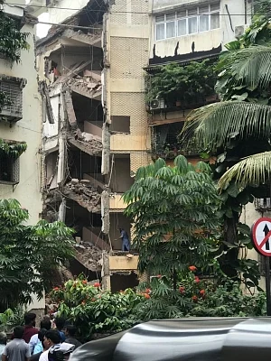 Mumbai: A portion of a five-storey building collapsed at Khar in Mumbai on Sep 24, 2019. (Photo: IANS)