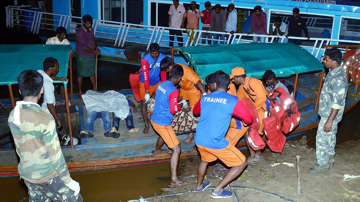 APSDRF personnel rescue passengers of a boat which capsized in the swollen Godavari river in East Godavari district of Andhra Pradesh.