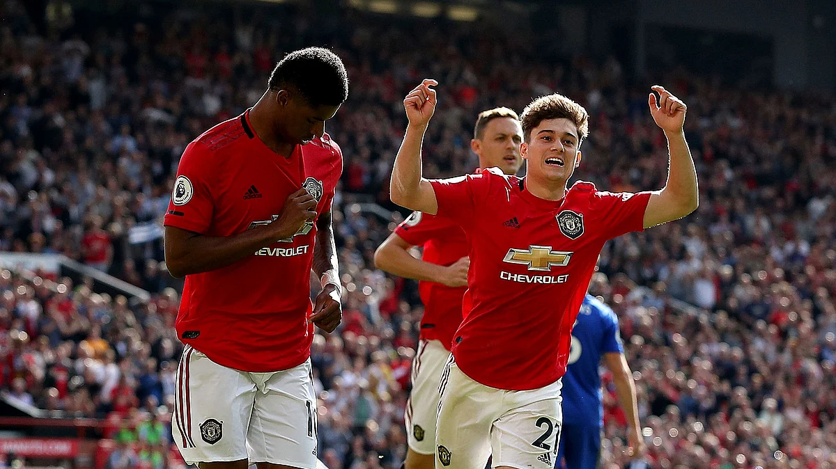Manchester United’s Marcus Rashford celebrates scoring his side’s first goal of the game from the penalty spot during the Premier League match at Old Trafford, Manchester.