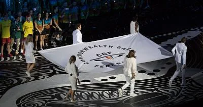 (180404) -- GOLD COAST, April 4, 2018 (Xinhua) -- The Commonwealth Games Federation flag is carried during the opening ceremony of the 2018 Gold Coast Commonwealth Games at the Carrara Stadium in the Gold Coast, Australia, April 4, 2018. (Xinhua/Zhu Hongye/IANS)