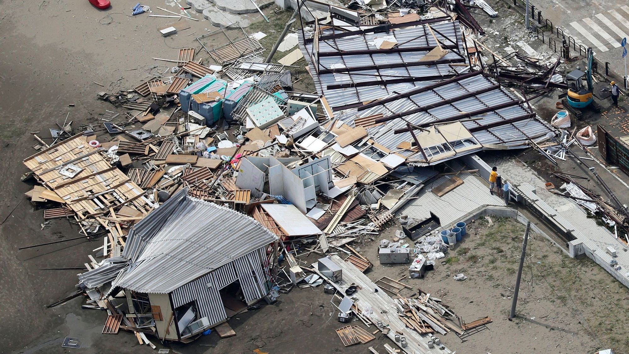 Beach houses are damaged as typhoon hits the beacfront area in Miura, south of Tokyo, Monday, 9 September, 2019.