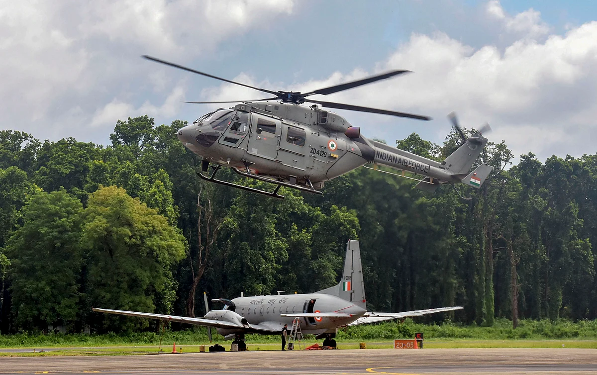 An ALH MK III Helicopter is used to demonstrate skills at Tezpur Air Force Station as part of the Diamond Jubilee celebration of the Indian Air Force Station in Tezpur, Thursday, 26 September.