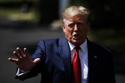 WASHINGTON, Aug. 21, 2019 (Xinhua) -- U.S. President Donald Trump speaks to reporters before leaving the White House in Washington D.C., the United States, on Aug. 21, 2019. Donald Trump said on Wednesday that his administration is seriously considering an executive order to end birthright citizenship. (Photo by Ting Shen/Xinhua/IANS)
