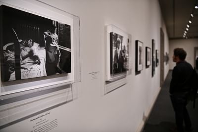WASHINGTON, Oct. 30, 2018 (Xinhua) -- A visitor views artworks during a preview of the exhibition "Gordon Parks: The New Tide, Early Work 1940-1950" at the National Gallery of Art in Washington D.C., the United States, on Oct. 30, 2018. The exhibition, bringing together 150 photographs and ephemera, focuses on the formative decade of the American photographer