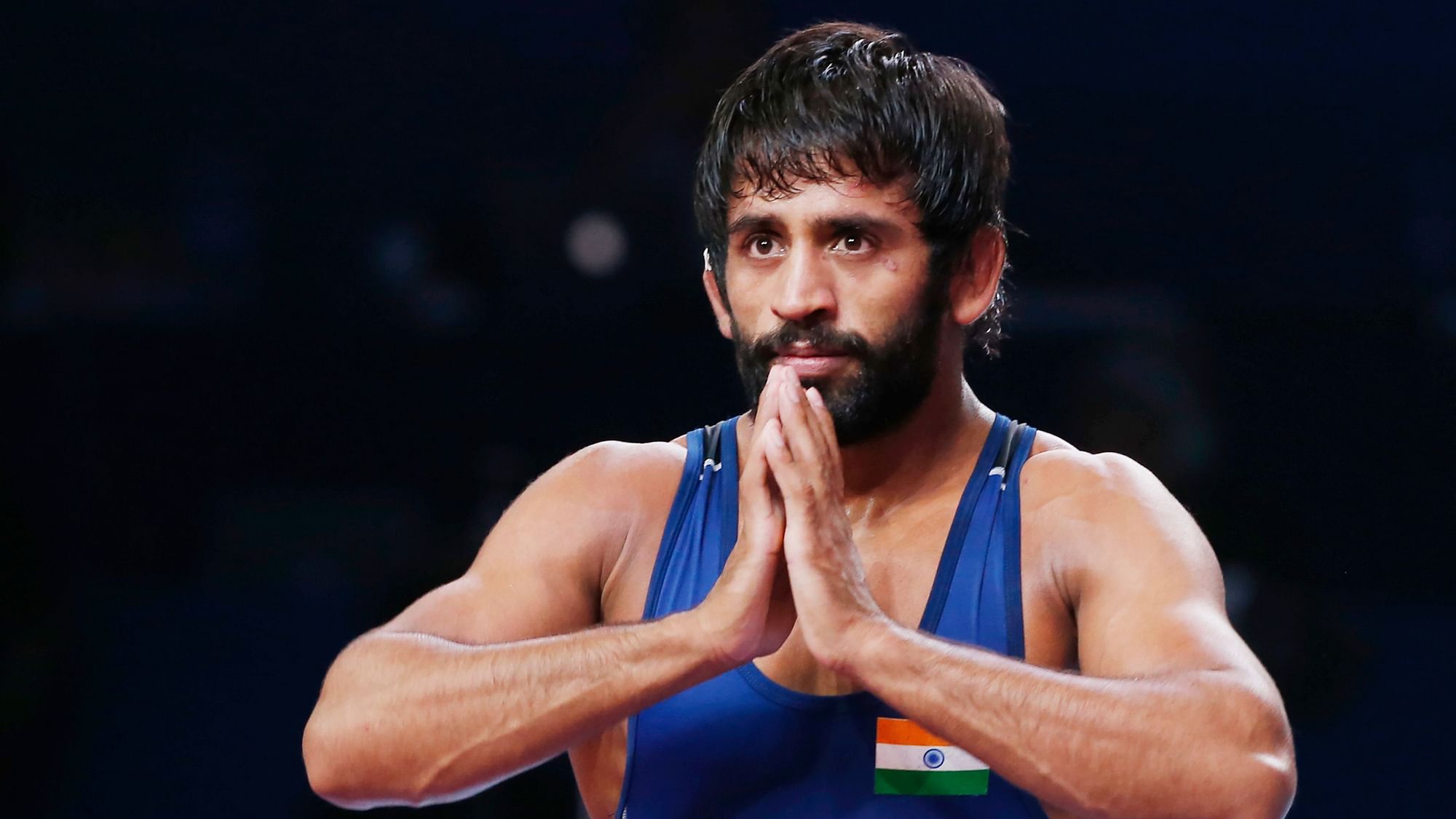 Indian wrestler Bajrang Punia lost the top rank in the 65kg category in the latest rankings issued by the international federation.