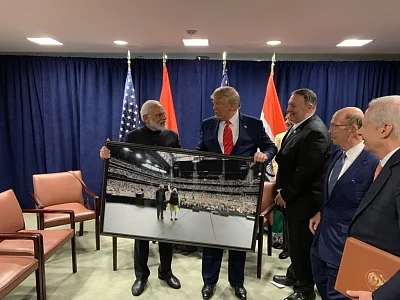 United Nations: Prime Minister Narendra Modi presents a framed photograph from the "Howdy Modi" event to US President Donald Trump during a meeting on the sidelines of the UNGA74 at United Nations on Sep 24, 2019. (Photo: IANS/PMO)