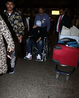 After shooting for his film "Angrezi Medium" in London, actor Irrfan Khan has returned to India. Irrfan was spotted at Mumbai airport on Friday. A lot of pictures are doing the rounds on the Internet in which he is seen hiding his face and using wheelchair to get to his  car, reports republicworld.com.