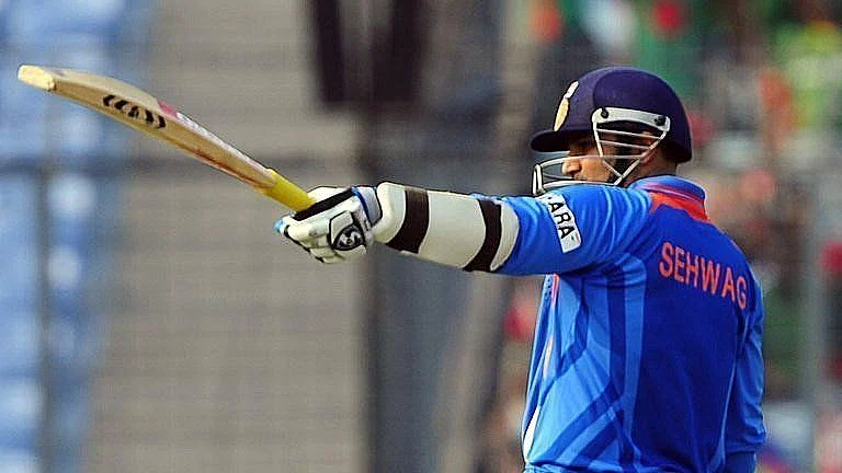 Sehwag wearing his numberless jersey.