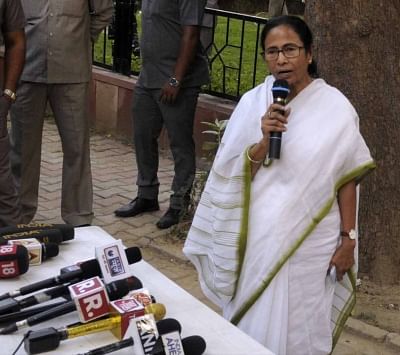 New Delhi: West Bengal Chief Minister Mamata Banerjee talks to media persons after meeting Prime Minister Narendra Modi, in New Delhi on Sep 18, 2019. (Photo: IANS)