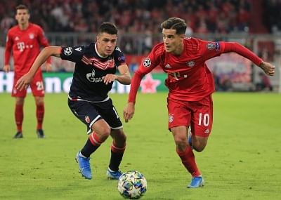 Munich, Sept. 19, 2019 Philippe Coutinho (R) of Bayern Munich breaks through the defense from Mateo Garcia of Red Star Belgrad during the group B match between FC Bayern Munich of Germany and Red Star Belgrad of Serbia at UEFA Champions League in Munich, Germany, on Sept. 18, 2019. Bayern Munich won 3-0. (Photo by Philippe Ruiz/Xinhua/IANS)