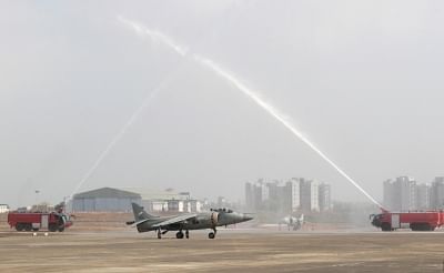 Dabolim: Sea Harriers receives water cannon salute after it completes its last flight in Dabolim, Goa on May 11, 2016. (Photo: IANS)