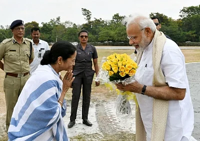 Prime Minister Narendra Modi and West Bengal Chief Minister Mamata Banerjee. (Photo: IANS/PIB)