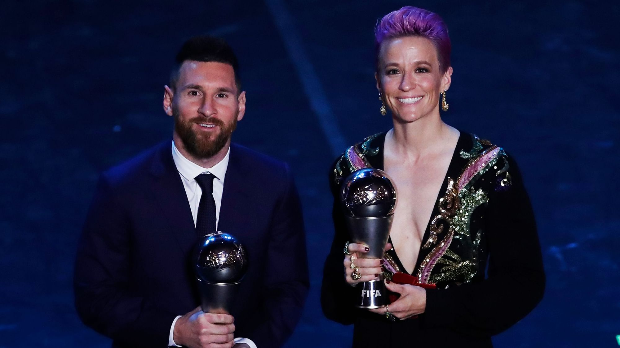 Best FIFA Football Awards 2019: Megan Rapinoe (right) and Lionel Messi with Player of the Year awards in Milan on Monday.
