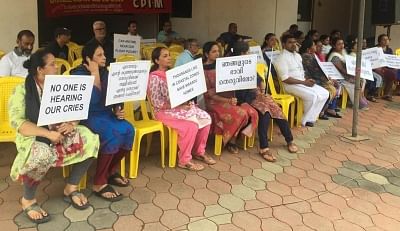 Maradu: Residents of the various flats, which have been ordered to be demolished by the Supreme Court stage a demonstration in front of Holy Faith apartment in Kerala