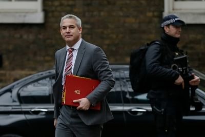 LONDON, Jan. 15, 2019 (Xinhua) -- British Brexit Secretary Stephen Barclay (L) arrives for a cabinet meeting at 10 Downing Street in London, Britain, on Jan. 15. 2019. A delayed parliamentary vote on the Brexit deal is scheduled to take place on Tuesday. (Xinhua/Tim Ireland/Li Muzi)