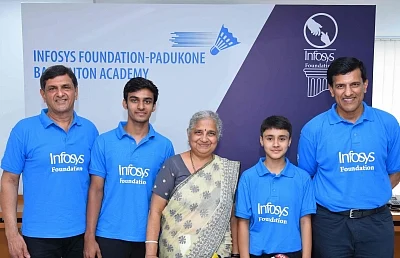 Bengaluru: Infosys Foundation Chairperson Sudha Murthy with Former shuttler Prakash Padukone during the signing of an MoU between Infosys Foundation and Padukone Badminton Academy, in Bengaluru on Sep 5, 2019. (Photo: IANS)