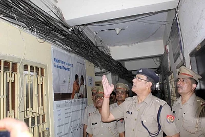 Lucknow Chief fire officer (CFO) Vijay Kumar Singh inspects fire safety norms at a Hazratganj coaching center in the wake of a devastating fire that broke out at a coaching centre in a four-storey building in Gujarat