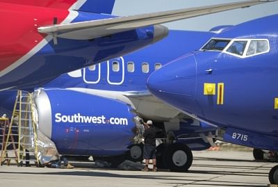 VICTORVILLE (U.S.), March 28, 2019 (Xinhua) -- A man works on a Southwest Airlines Boeing 737 Max aircraft at the Southern California Logistics Airport, also known as Victorville Airport, in Victorville, California, the United States, on March 27, 2019. A Southwest Airlines Boeing 737 Max, on its way to Victorville, where Southwest Airlines is storing the airplanes, to be grounded, made an emergency landing at the Orlando International Airport (OIA) Tuesday afternoon, authorities said. (Xinhua/Z