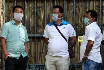 People wear masks to avoid swine flu. (File Photo: IANS)