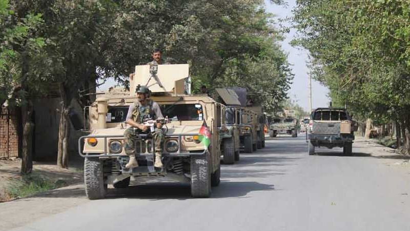 Afghan security forces arrive during a fight against Taliban fighters in Kunduz province north of Kabul.
