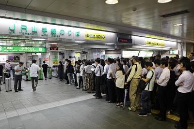 TOKYO, Sept. 9, 2019 (Xinhua) -- Commuters wait at Meguro Station as train operation is suspended due to typhoon Faxai in Tokyo, Japan, Sept. 9, 2019. Typhoon Faxai made landfall near Tokyo early Monday morning causing major disruption to transportation networks with train services being suspended and flights being halted as the capital and surrounded areas were lashed by torrential rain and battered by gusty winds. (Xinhua/Du Xiaoyi/IANS)