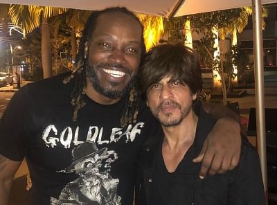 West Indies cricket star Chris Gayle has shared a photograph with Bollywood actor Shah Rukh Khan, who is currently in the Caribbean Islands rooting for Trinbago Knight Riders in the ongoing Caribbean Premier League.
