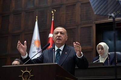 ANKARA, June 25, 2019 (Xinhua) -- Turkish President Recep Tayyip Erdogan (Front) addresses lawmakers of the ruling Justice and Development Party (AKP) in Ankara, Turkey, on June 25, 2019. Recep Tayyip Erdogan on Tuesday vowed to learn lessons from "the messages that given by people" in June 23 re-elections in Istanbul at which his ruling party suffered a historic blow. (Xinhua/Mustafa Kaya/IANS)